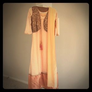 Beautiful Pakistani peach evening festival dress